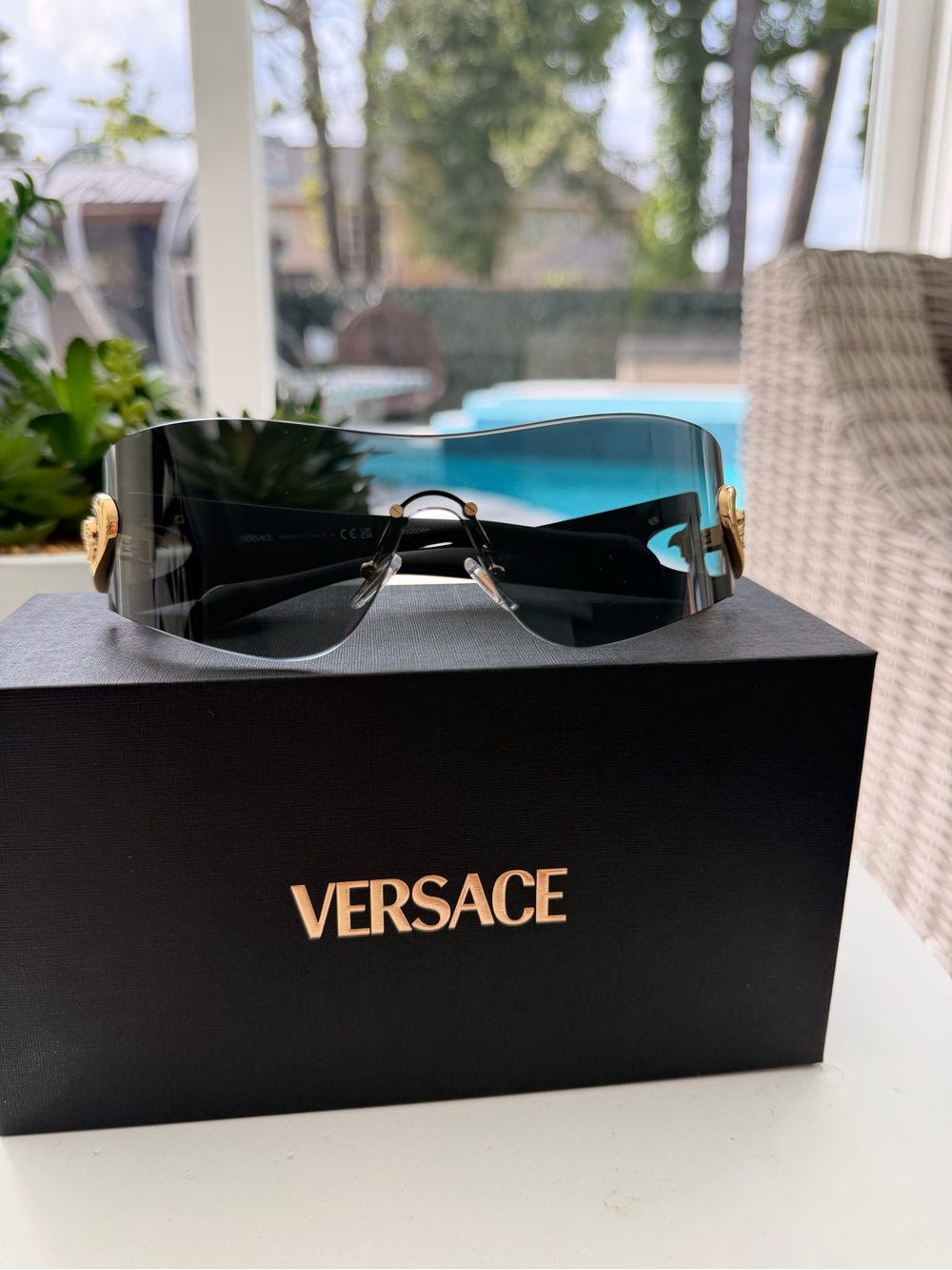 Versace Black Rimless Shield Sunglasses with Gold Accents
